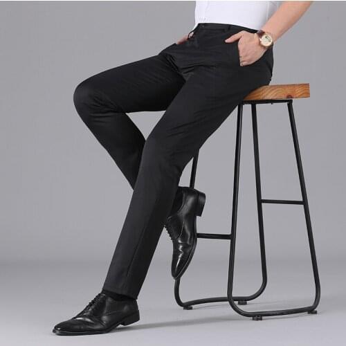 Summer thin breathable ice silk micro-elastic flat waist trousers mens loose solid color youth straight daddy pants casual trou