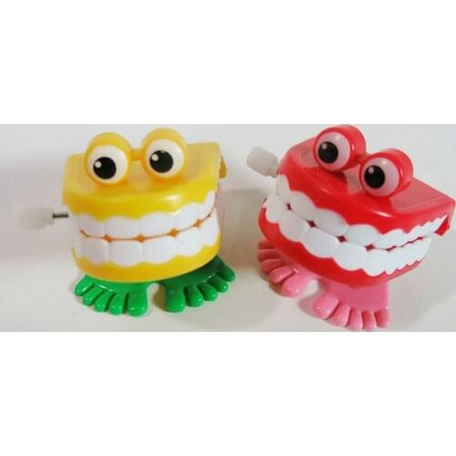 1pcs Clockwork Toy Upper Chain Jumping Tooth Toy Children Jump Teeth Running Clockwork Spring Wind Up Toy