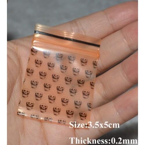 1000pcs/Lot,3.5x5cm 1.4''x2''Orange printed Skull PE ZipLock/Reclosable Plastic Bag,Powder packing bag