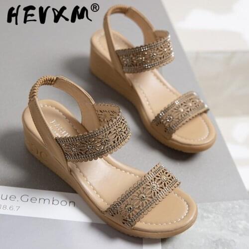 2021 Woman Shoes The New Solid Color Casual Shoes Summer Wedge Sandals Woman Hollow Flower Design Platform Platform Shoes