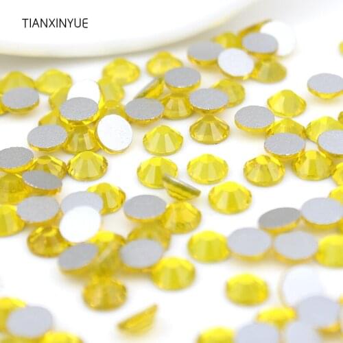 TIANXINYUE ss3-ss30 Citrine Crystal nail Rhinestones Non Hot Fix FlatBack strass Sewing Fabric Phones Decorations rhinestone