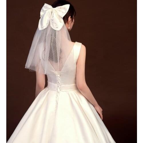 JIERUIZE Pearls Beaded Bow Short Wedding Veils One Layer Bridal Veils with Comb Wedding Accessories 2021