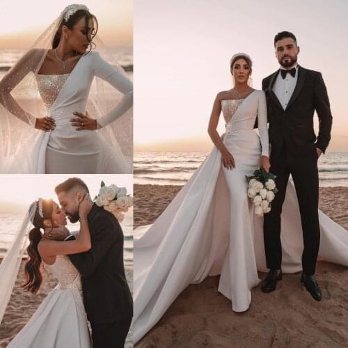 Stunning Ivory Saudi Arabic Dubai Modern Backless Wedding Dresses Sexy One Shoulder Sequins Long Train Gowns Formal