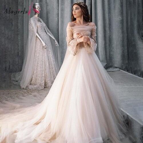Luxury Transparent Embroidery Wedding Gown Pleat Boat Neck Flare Sleeve Bride Dress Long Train Robe de soirée de mariage 2020