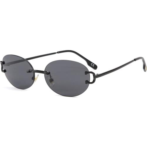 2021 fashion street shooting personality small glasses European and American trend sunglasses round rimless trim sunglasses