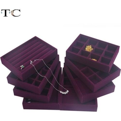 High-end Elegant Jewelry Showcases Purple Velvet Stacked Ring Earrings On Display Tray Holders Stored By The Organizer