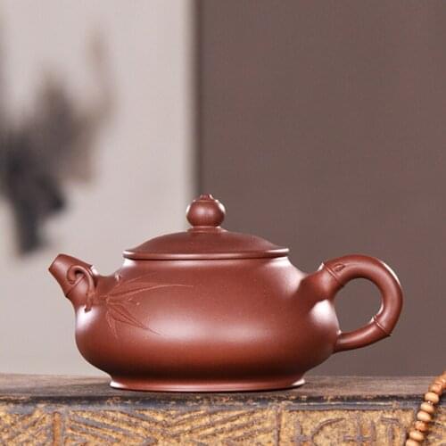 A high-end undressed ore purple clay teapot tea famous tea set manually office bamboo pot of classic products
