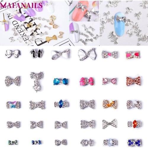 New! 10pcs/Lot Bow Tie Alloy Bow Knot Charms Jewelry Nail Art Crystal Rhinestones for Nails Decorations Accessories (JE114-143)