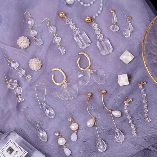 Thin face transparent crystal pearl earrings cross-border European and American acrylic long pendant jewelry