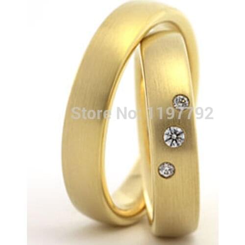 Top quality custom made yellow gold color health titanium steel wedding rings sets for him and her