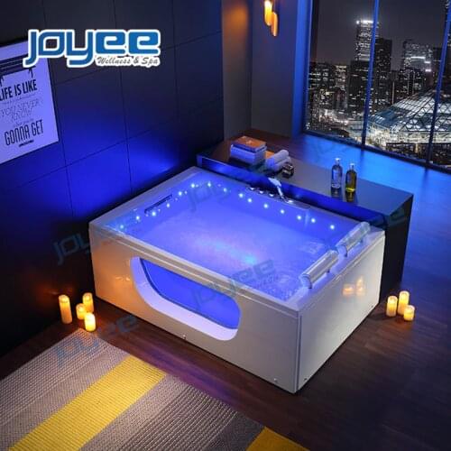 JOYEE High Quality Tempered Glass Side Acrylic Corner Bathtub with Comfortable Hand Shower Whirlpool Buthtubs