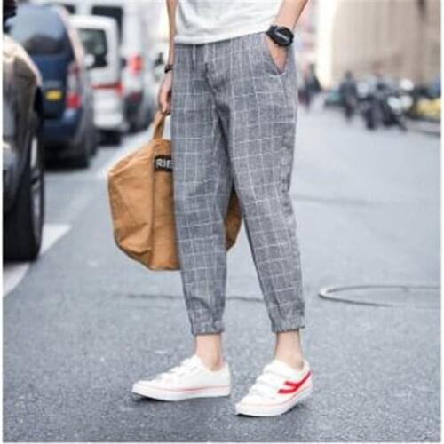 Spring and summer mens pants Korean version of nine point pants mens small leg casual pants Plaid legging slim boys
