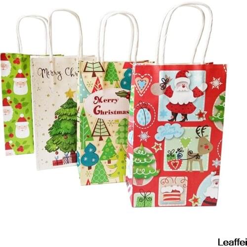 10 Pcs/lot Medium Christmas bags Santa Claus Snowman Christmastree Paper Gift Bag For Event Party With Handles 27*21*11cm