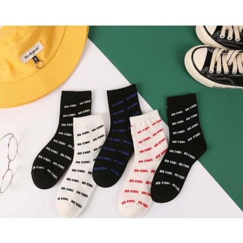 New Korean version of the simple letter mens tube cotton socks street fashion unisex men and women casual letter socks