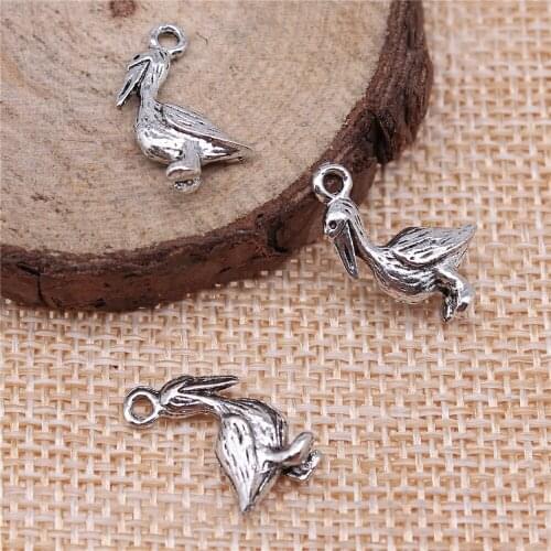 Free shipping 54pcs 18x9mm antique silver Pelican charms diy retro jewelry fit Earring keychain hair card pendant accessories