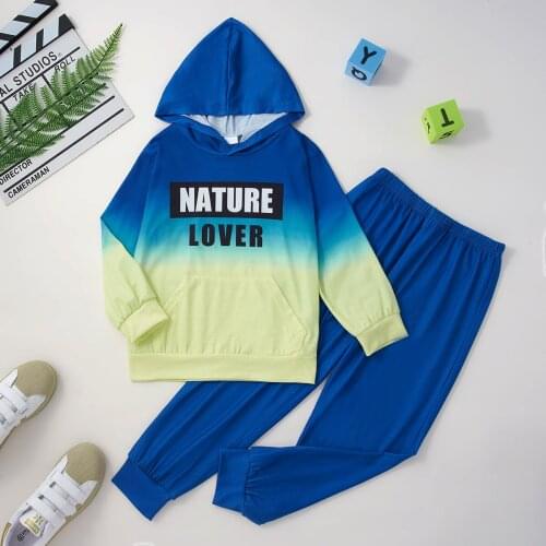 PatPat 2-piece Kid Boy Letter Print Gradient Colorblock Hoodie and Elasticized Solid Pants Casual Set