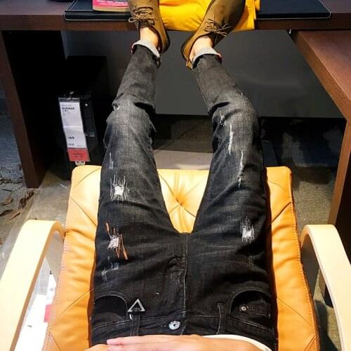 Shattered jeans mens slim feet stretch straight Korean trend 2020 beggar pants spring summer cowboy teenagers denim pants