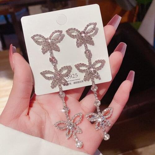 Korea spring and summer new five-leaf flower tassel long earring temperament exquisite elegant Trend Fashion Stud Earrings