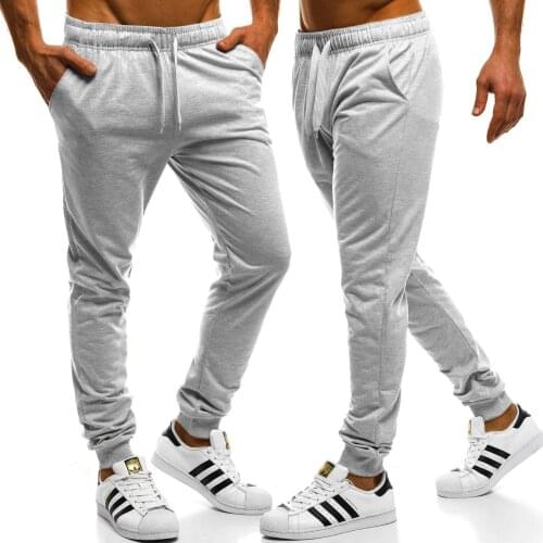 Luxury Mens New Product Pure color Tethered Casual Trousers Loose and Comfortable Feet Mens Trousers 5 Ccolors Available