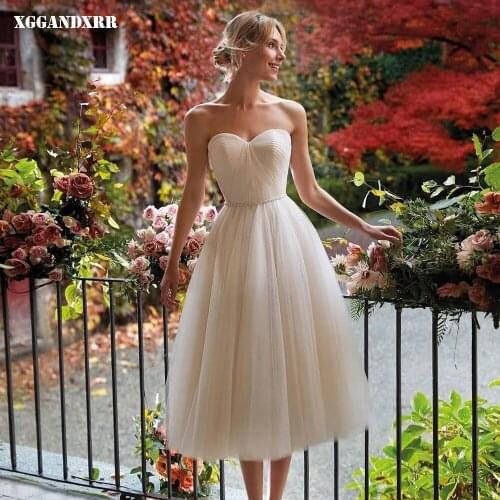 Charming A-Line Prom Dress 2022 Tulle Pleats Sashes Tea-Length Ivory Sleeveless Party Gown Plus Size