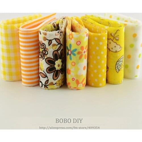 7pcs/lot jelly roll fabric strips sewing textile yellow sets quilting dolls cloths tildas Flowers Checks Dots Strips