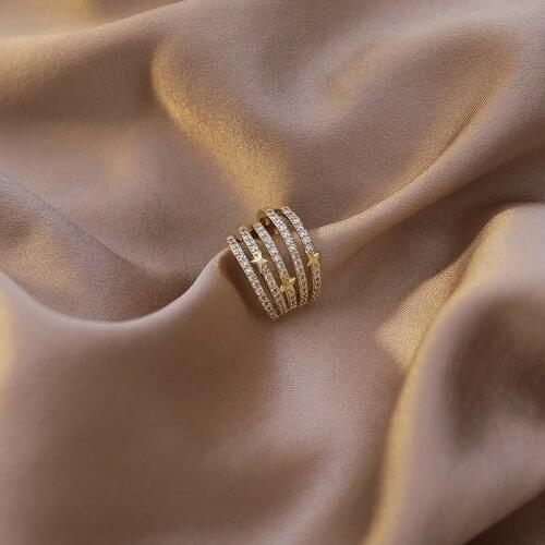 Wholesale No Pierced Ear Clip 2021 Trendy Micro-inlaid Zircon Star Multi-layer Ear Bone Clip Earrings French Net Red Ear Buckle