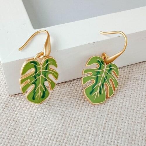 Mini tree leaf ornaments fashion personality oiled leaf earrings cold wind quality hollow alloy earrings