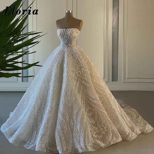 Luxurious Robes De Mariée Pearls Beaded Wedding Dresses Customized Strapless Bride Dress Dubai Arabic Long Train Bridal Gown