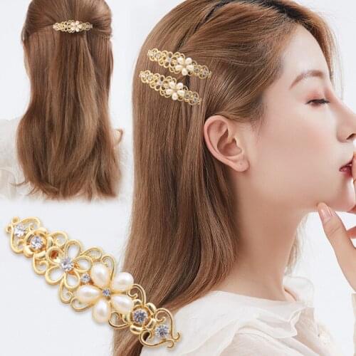 Korean version of the pearl hollow spring hairpin metal word clip elegant female fashion hairpin jewelry