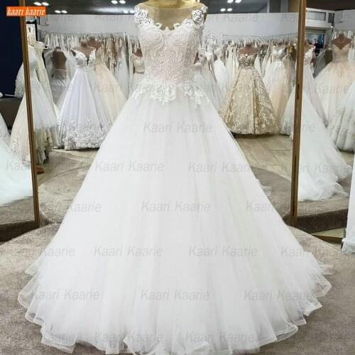 Ball Gown Wedding Dresses 2021 White robe de mariée Exqusite Lace Appliqued fluffy Bride Dress Zipper Sleeveless suknie slubne