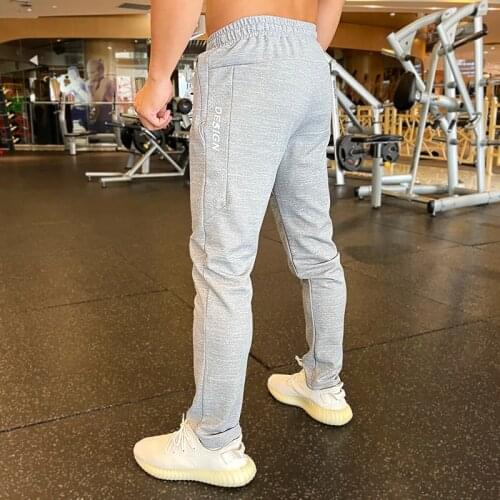 Summer Men Sports Running Pants zipper pocket breathable Athletic loose Training sport Legging jogging fitness Gym Trousers