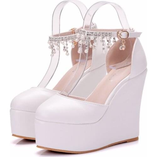 Summer thick sole slope heel round head pearl tassel super high heel White PU sandals soft soled womens shoes wedding shoes