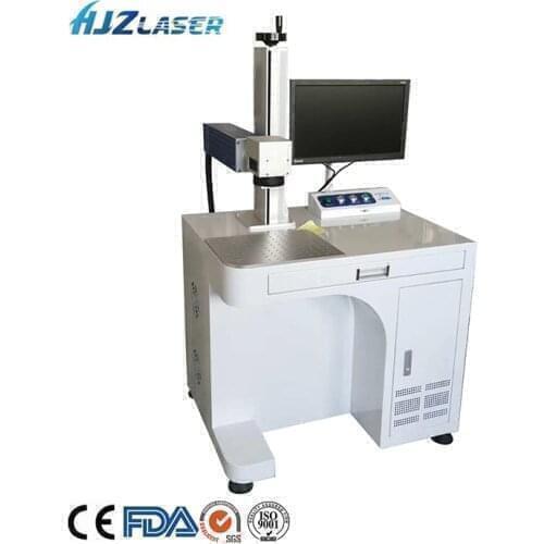 HJZ Laser High performance CO2 jeans bamboo wooden laser marking machine for leather rubber fabric plastic rubber factory price