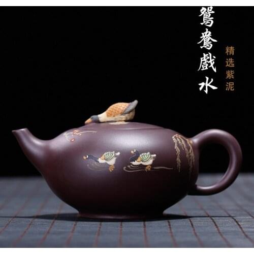 Clay, purple eggplant, mud, mandarin duck playing in water, hand-made mud painted teapot, color painted mandarin duck