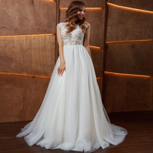 O-Neck Cap Sleeves A Line Tulle Wedding Dresses 2020 Vintage Lace Applique Sexy Sheer Top Buttons Back Bride Gowns Floor Length