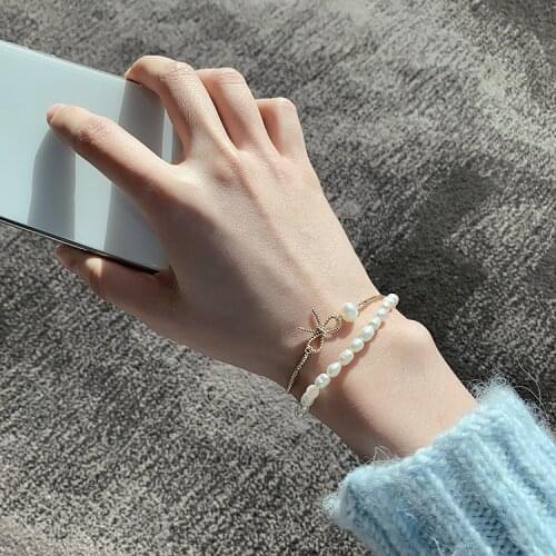 Korean fashion design baroque double-layer pearl bracelet ins bow hand link day gift hand accessories for women