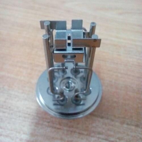 Ion source and other accessories of helium mass spectrometer leak detector