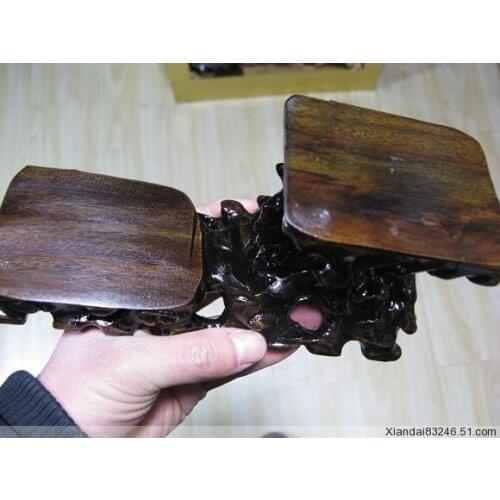 Natural wood stand pedestal holding