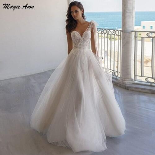 Magic Awn One Shoulder Boho Wedding Dresses Pearls Beaded Backless Beach Country Bride Dress Illusion Robe De Mariage 2021