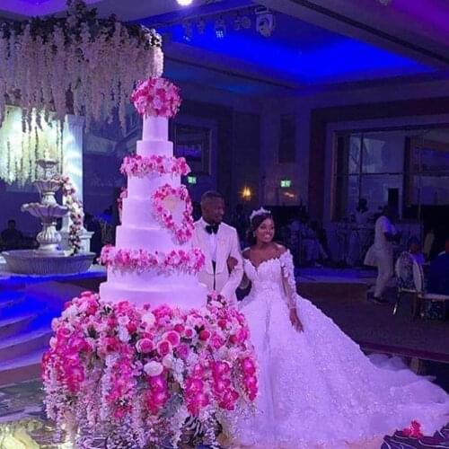 Stunning Plus Size Wedding Dresses Handmade Flowers 3D Lace Applique Beaded Bridal Gowns Dubai African Crystal Tulle Wedding