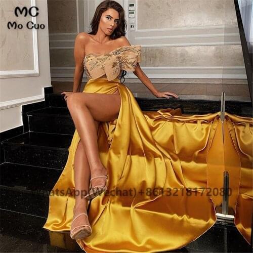 2021 Luxurious Gold Sexy Evening Dresses Long Beaded Satin Robe De Soiree Bow Side Slit Arabic Aso Evening Party Prom Dress