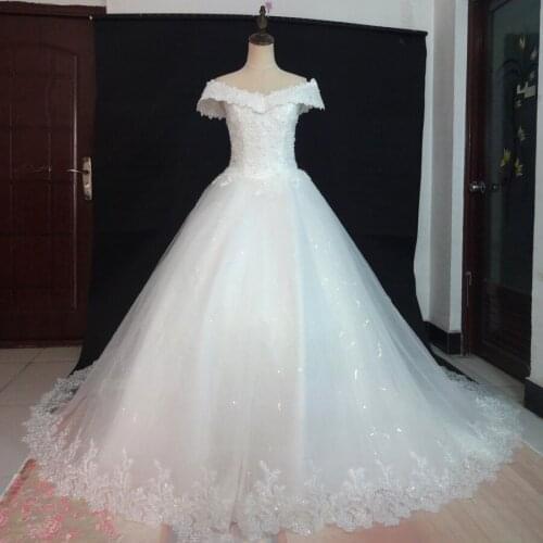 Real Photos Luxury Bling Wedding Dresses 2021 New Arrival Ball Gown Long Tail Ivory Embroidery Lace Edge Short Sleeve