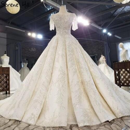 Ivory High-end Sparkle Short Sleeves Wedding Dresses 2020 Dubai Beading Crystal Sexy Bridal Gowns HX0216 Custom Made