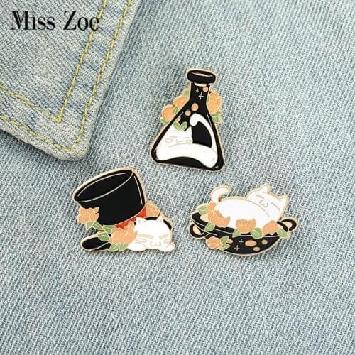 White Cats Enamel Pin Custom Magic Hat Pot Bottle Brooch Bag Clothes Lapel Pin Badge Cartoon Animal Jewelry Gift for Kid Friend