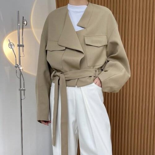 Spring and autumn womens casual solid color belts should be decorated with loose short jackets