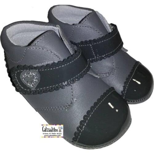D baby girls leather and patent leather flat sole boots