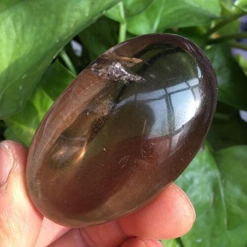 1pcs Beautiful natural crystal natural smoky color crystal hand play rolling stones 100-110g