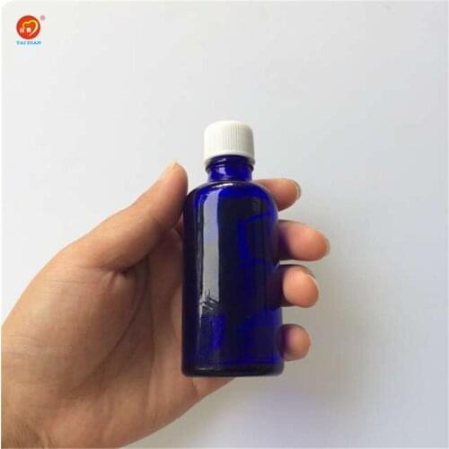 Wholesale 50ml Blue Glass Liquid Bottles with White Cap Sealing up Packing Liquid Bottles Essential Oil Jars 12pcs/lot
