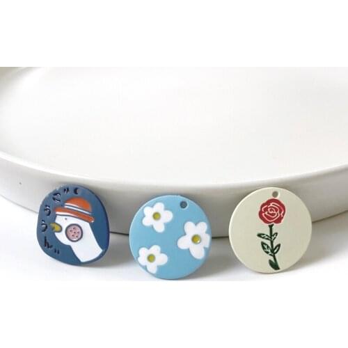 Hand-painted style childlike cute big white goose rose small flower round brand DIY earring key chain material