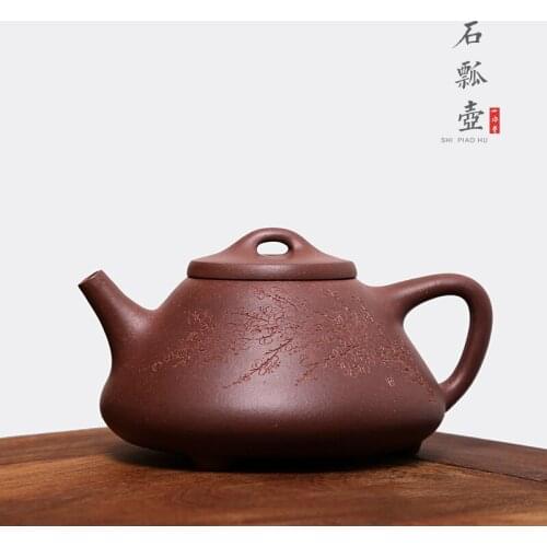 Monohydrate hall yixing recommended the teapot tea pure manual and old purple clay stone gourd ladle pot of 450 cc